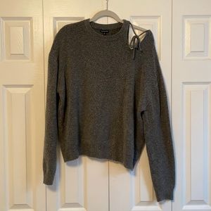 Grey sweater with cutout shoulder
